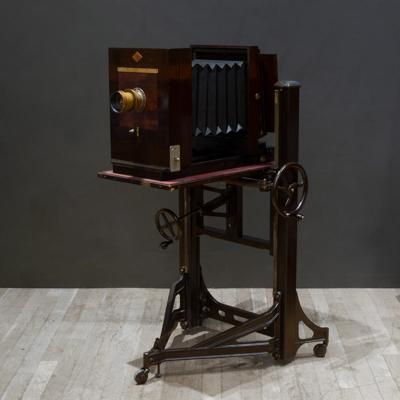Large antique wooden format camera on a stand