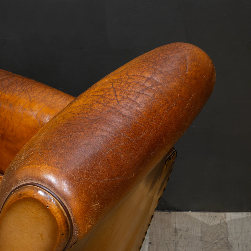 Pair of Distressed French Leather Club Chairs c.1930