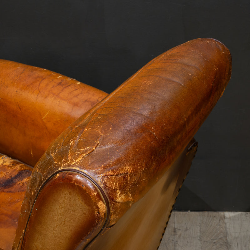 Pair of Distressed French Leather Club Chairs c.1930
