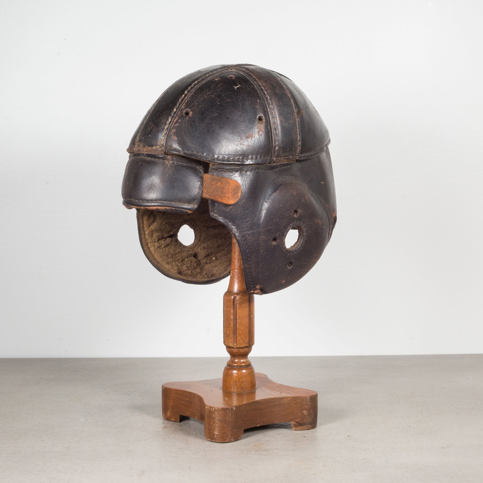 Antique Leather Football Helmet and Stand c.1900