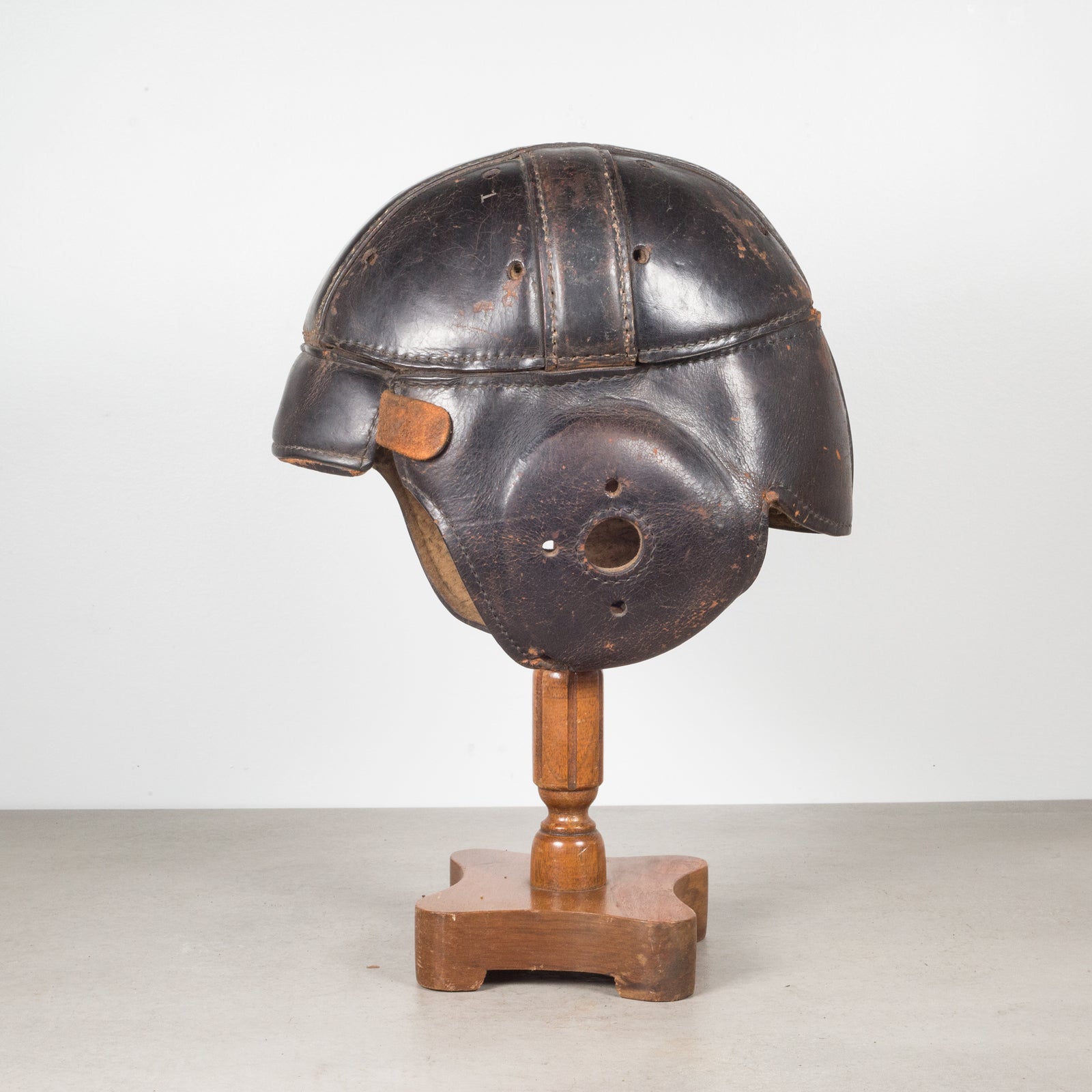 Antique Leather Football Helmet and Stand c.1900
