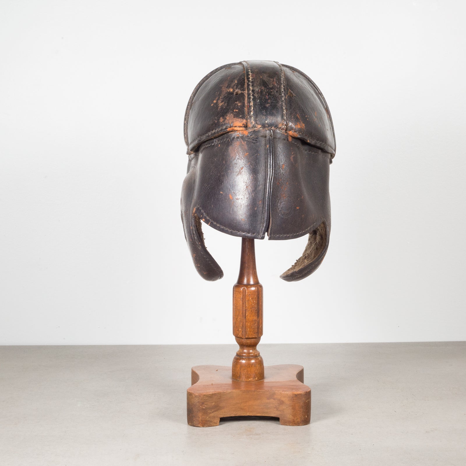 Antique Leather Football Helmet and Stand c.1900