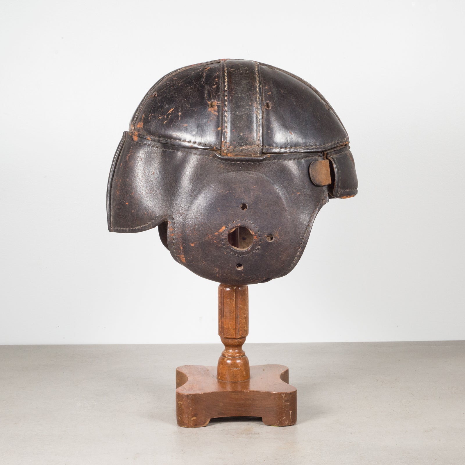 Antique Leather Football Helmet and Stand c.1900