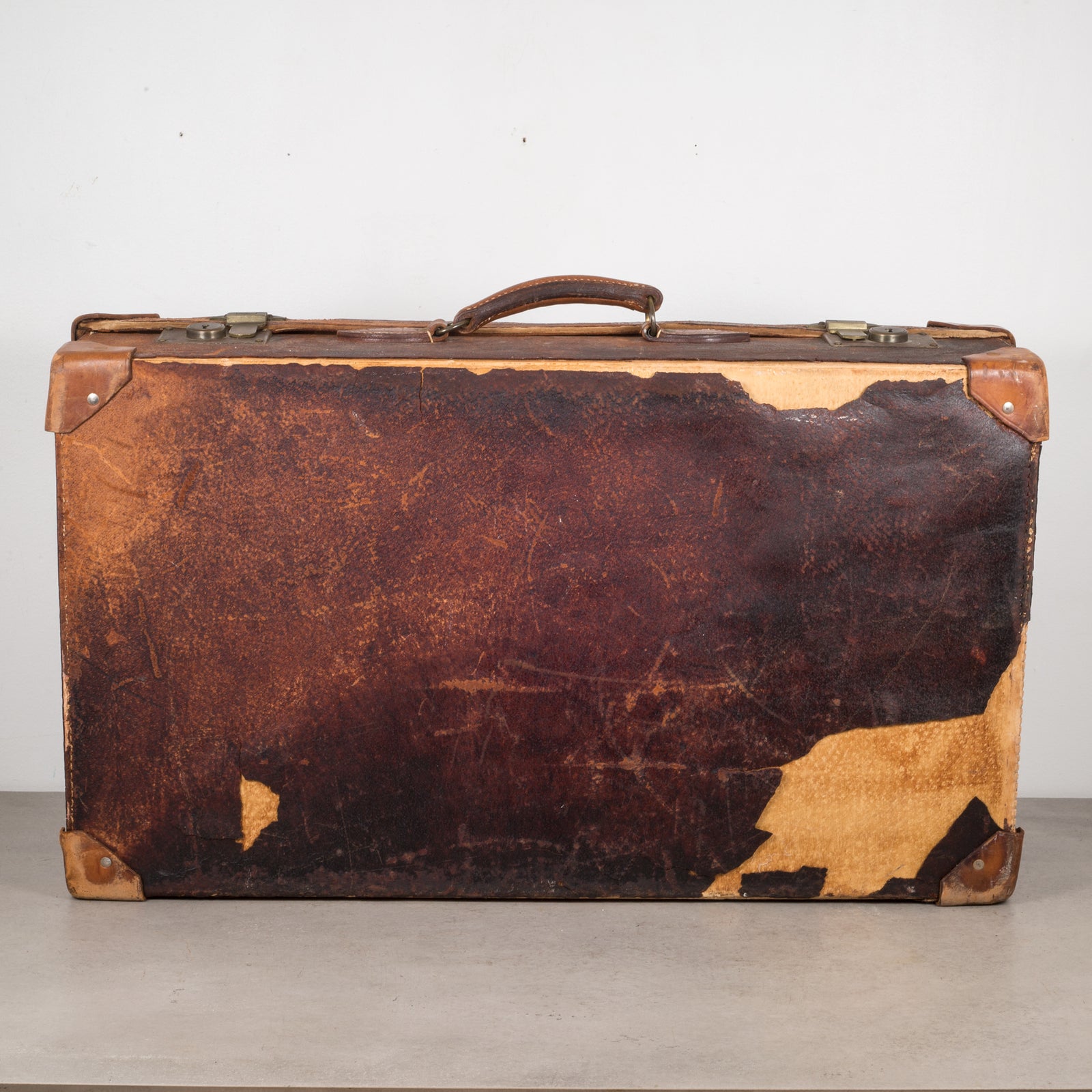 distressed-leather-suitcase-