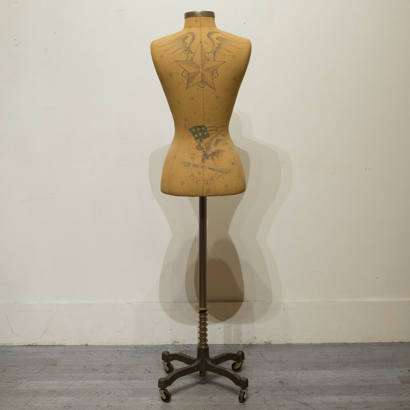 Adjustable Tattooed Female Mannequin on Antique Style Base Adjustable Tattooed Female Mannequin on Antique Style Base